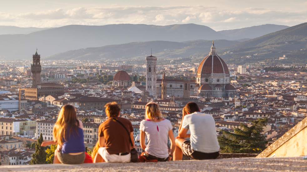 Free events in May 2021 group of people sat on hill overlooking Florence